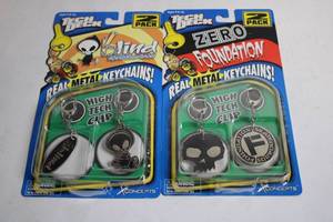 lot 44 image: Set of 4 Tech Deck Real Metal Keychains with High Tech Clips