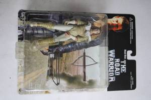 lot 73 image: Vintage Mad Max The Road Warrior Action Figure with Accessories
