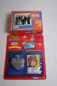 lot 79 image: Vintage Police Academy Wacky Wallet & 90210 Puzzle Set