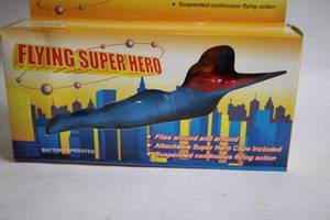 lot 97 image: Battery Operated Flying Super Hero Toy with Attachments