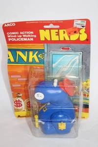 lot 169 image: Vintage Arco Comic Action Wind-Up Walking Policeman Toy