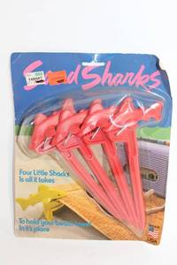 lot 206 image: Set of 4 Sand Shark Beach Towel Stakes