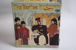 lot 301 image: The Beatles Yellow Submarine Puzzle - Over 100 Pieces