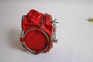 lot 322 image: Red Leather Drawstring Bag with Chain Accents