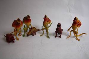 lot 490 image: Set of 11 Vintage Plastic Dinosaur Figures with Vibrant Colors