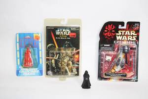 lot 504 image: Star Wars Collectible Set C-3PO Key Chain, Emperors Royal Guard Eraser, Darth Vader Figurine & Underwater Accessory Set