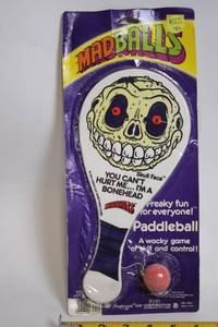 lot 511 image: 1985 Madballs Skull Face Paddleball Game