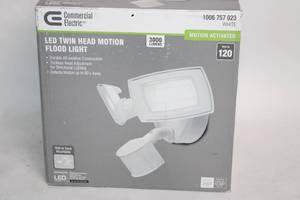 lot 111 image: Commercial Electric LED Twin Head Motion Flood Light