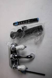 lot 233 image: Two-Handle Chrome Bathroom Faucet Set with Accessories