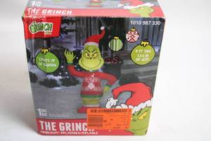 lot 416 image: The Grinch 4ft Tall Light-Up Christmas Inflatable