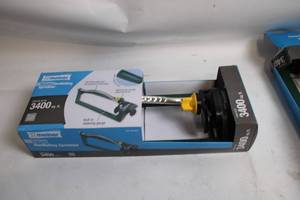 lot 436 image: Melnor Deluxe Oscillating Sprinkler with Built-in Watering Gauge