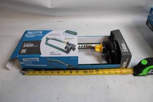 lot 439 image: Melnor Deluxe Oscillating Sprinkler with 18 Brass Jets