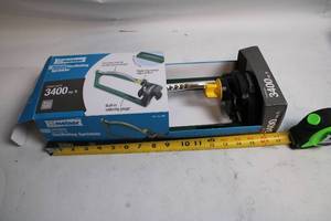 lot 440 image: Melnor Deluxe Oscillating Sprinkler with Built-in Watering Gauge