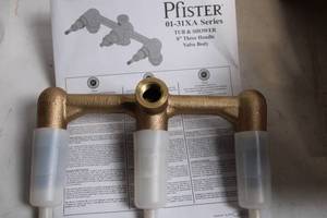 lot 488 image: Pfister 01-31XA Series 8 Three Handle Tub & Shower Valve Body