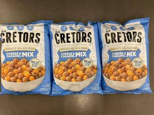 lot 28 image: 3 Bags of G.H. Cretors Cheese & Caramel Mix Popcorn, Value Size