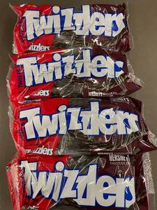 lot 39 image: Twizzlers Candy Assortment - 4 Packs of Hersheys Chocolate & Strawberry Flavors