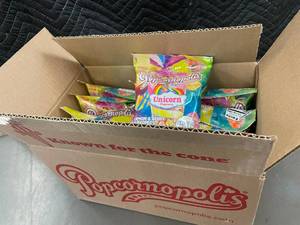 lot 91 image: Popcornopolis Unicorn Popcorn Lemon & Berry Flavored Candy Coated Popcorn - 12 Bags