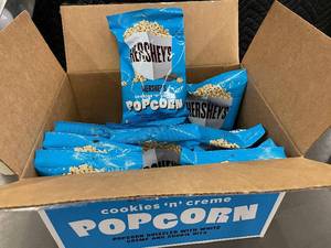lot 104 image: 12 Pack of Hersheys Cookies n Creme Popcorn