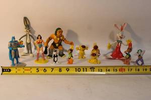lot 175 image: Set of 12 Cartoon Character Figurines Including Batman and Bugs Bunny