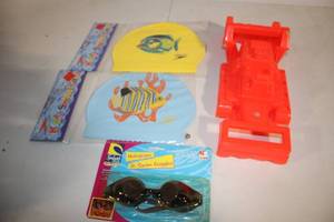 lot 237 image: Set of Kids Swim Caps, Goggles, and Red Toy Vehicle