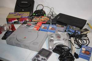 lot A-273 image: Vintage Gaming Collection with Sony PlayStation and Sega Genesis Consoles