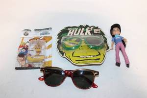 lot 327 image: Lot of Collector Items Hulk Sunglasses, Street Fighter Dhalsim Figure, Doll, and Sunglasses