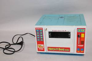 lot 330 image: Vintage Tyco Watch It Bake Oven for Kids with Timer Feature