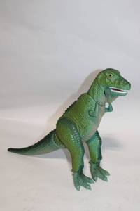 lot 331 image: Green Dinosaur Action Figure with Movable Limbs