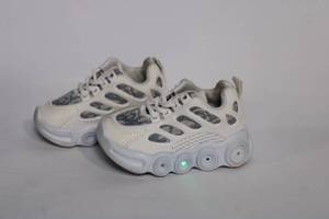 lot 401 image: Pair of Childrens Light-Up Sneakers with Bubble Sole Design, Size 28