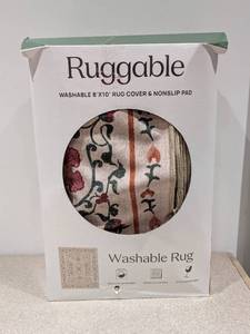 lot 86 image: RUGGABLE MACHINE WASHABLE 8x10 RUG COVER & NONSLIP PAD