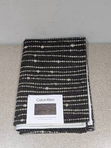 lot 82 image: NEW CALVIN KLEIN CHAV ACCENT RUG WITH NONSKID BACKING