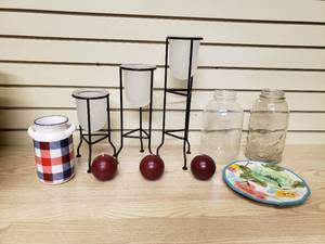 lot 42 image: 3 Candles and holders, 2 larger jars, 1 decorative plate, and decorative container