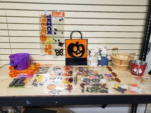 lot 47 image: Halloween, Easter and Fall decorations including many gel stick window clings