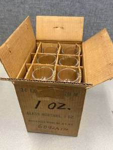 lot 20 image: 24 - Glass Mortors Mercer Glass 1oz.