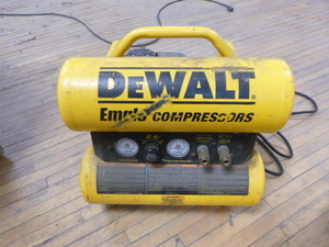 lot 11 image: DeWalt Electric 4 Gallon Hand Carry Compressor