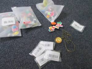 lot 142 image: 5 Ouija Pendants, 3 pks Shoe Charms...