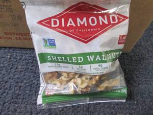 lot 267 image: 12- 2.25 oz Diamond Shelled Walnuts...