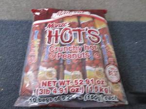 lot 323 image: 10- 5.29 oz Manze Hots Crunchy Hot...