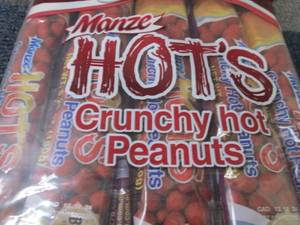 lot 324 image: 10- 5.29 oz Manze Hots Crunchy Hot...