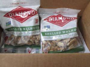 lot 443 image: 12- 2.25 oz Diamond Shelled Walnuts...