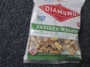 lot 444 image: 12- 2.25 oz Diamond Shelled Walnuts...