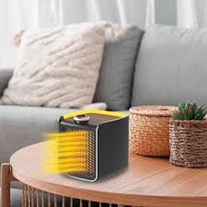 lot 15 image: Lot of  4944 BTU Fan Heater Electric Personal Space Heater Furnace with 2-Adjustable Settings Customer Returns See Pictures