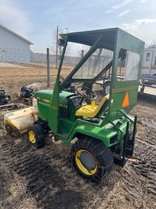John Deere 318 With Hydraulics and cab   needs work but great project for restoration