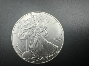 lot 11 image: 2014 BU Silver Eagle Dollar