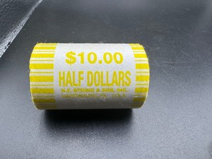 lot 20 image: Unopened Fed Roll Kennedy Half Dollars, End Coins Appear to be BU