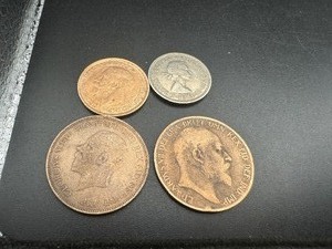 lot 24 image: Four British Coins Including 1920 12 Cent