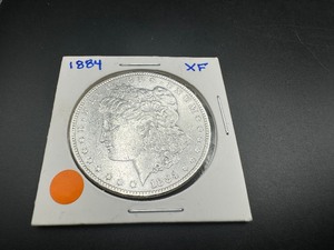 lot 30 image: 1884 XF Morgan Dollar