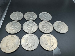 lot 34 image: Ten Circulated Ike Dollars