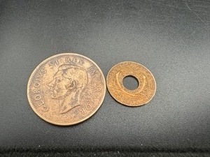 lot 36 image: Two Pre-WWII African Coins, Scarce South African 1938 Dollar  1935 East African Cent