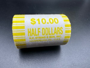 lot 42 image: Unopened Fed Roll Kennedy Half Dollars, End Coins Appear to be BU